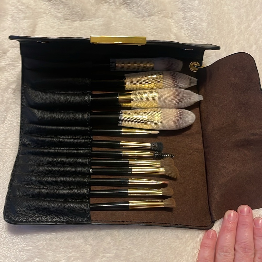 New, makeup brush set with matching cosmetic bag.